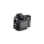 Tilta full camera cage for Panasonic S1R II featuring a three-point locking mechanism, cable clamps, and 1/4-20 thread mounts for secure grip and versatile accessory attachment