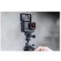 Insta360 Multi Mount INST110-40 with action camera attached, showcasing adjustable tripod and selfie stick functionality for versatile shooting angles.