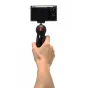 Manfrotto PIXI Mini trijods melnā krāsā ar kompaktu fotoaparātu, redzama intuitīva lodveida galva un droša fiksācija