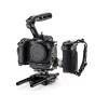 Tilta camera cage with cooling system for Canon R5 Mark II, featuring a side handle with battery pack, top handle, and adjustable baseplate for professional video rig setup.