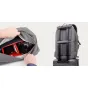 Moment Everything Backpack 21L Overnight in grey with a camera and lenses inside, highlighting internal organization and camera storage system