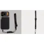 Moment black adjustable wrist strap with QuickLink connector attached to smartphone camera case, featuring durable nylon webbing and aluminum buckles for secure phone carrying