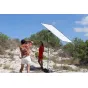 Lastolite Skylite Rapid Medium Fabric Diffuser 1.1 x 2m used outdoors for soft lighting in portrait photography, attached to a portable frame.