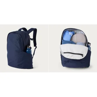 Moment Everything Backpack 21L Overnight in navy with open clamshell view showing organized storage for laptop, jacket, and water bottle