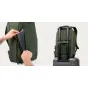 Moment Everything Backpack 21L Overnight Olive with spacious clamshell interior and laptop sleeve, shown open for easy packing and closed on suitcase for travel convenience