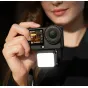 Ulanzi LM24 Mini Fill Light II with hot shoe mount attached to action camera, illuminating for outdoor vlogging and photography