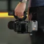 Tilta camera cage for Canon C50 Pro with top and side handles, cable clamps, and Arca-compatible baseplate for versatile rig setups