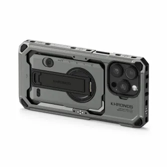 Tilta Khronos iPhone 16 Pro case with robust camera cage structure, featuring modular accessory mounts, locking clamp mechanism, and electronic contacts for power passthrough.