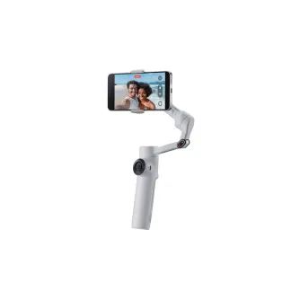 Insta360 Flow 2 smart stabilizer with AI tracking in use, holding smartphone for selfie recording with extended arm and magnetic clip