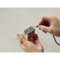 Tilta NP-W126S divkanāla bateriju lādētājs pelēkzaļā krāsā ar USB-C pieslēgumu un LCD ekrānu Fujifilm baterijām