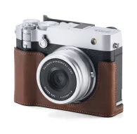 Tilta vintage leather camera cage for Fujifilm GFX100RF with integrated hand grip and thumb bracket, showcasing front lens and ergonomic designTilta vintage leather camera cage for Fujifilm GFX100RF with integrated hand grip and thumb bracket, showcasing front lens and ergonomic design