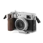 Tilta Vintage Camera Cage for Fujifilm X100VI with walnut grip, thumb hot shoe stabilizer, and leather strap attachment - compact silver travel kit