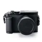 Tilta vintage-style camera cage for Leica Q3 featuring a textured grip and lens cap - front-right view