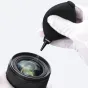 Ulanzi CO26 camera cleaning kit dust blower in use with lens cap magnifier for precise lens cleaning