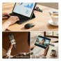 Ulanzi CR1 wireless file transfer device connected to a laptop for fast data transfer and peripheral connection with USB-C compatibility. The sleek black design features visible connection points and a lanyard loop.