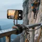 Ulanzi MA50 magnetic phone holder mounted on a railing with a carabiner for outdoor filming, smartphone recording 4K video in a rugged adventure setting