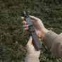 Ulanzi PK-12 Mini Quadpod Battery Handle for DJI Pocket 3 with extendable tripod and ergonomic grip in use
