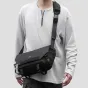Ulanzi B010 9L water-resistant sling bag with customizable dividers, worn as a crossbody camera bag for photographers
