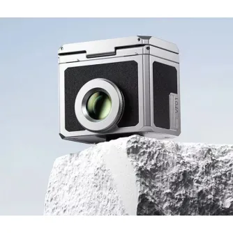 Ulanzi VF01 silver waist-level optical viewfinder with magnetic sunshade for low-angle photography, compact design on textured rock surface