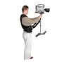 Varizoom GT Single-Arm Stabilizer with ergonomic vest and 3-axis gimbal in use, featuring integrated 5-inch monitor and precision gear-drive stage for professional camera stabilization up to 98 kg