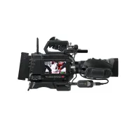 Blackmagic Design URSA Cine 12K LF 100G professional cinema camera with live action preview on screen, connected to external recorder, featuring B4 lens mount and leather gripBlackmagic Design URSA Cine 12K LF 100G professional cinema camera with live action preview on screen, connected to external recorder, featuring B4 lens mount and leather grip