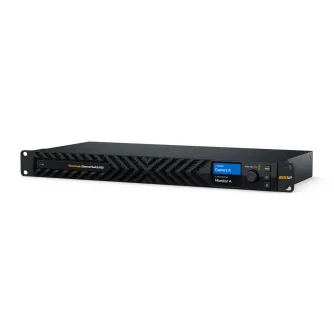 Blackmagic Design Ethernet Switch 820 front panel with 100G and 10G ports for SMPTE-2110 IP video routing, featuring an intuitive LCD display and menu controls