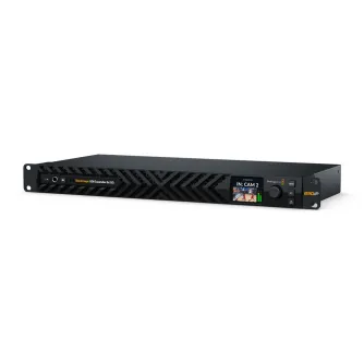 Blackmagic Design SDI Expander 8x12G priekšpuses skats ar aktīvo video monitoringu LCD ekrānā, 8 divvirzienu 12G-SDI savienojumi SMPTE-2110 IP sistēmām