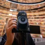 Viltrox AF 9mm F2.8 Air ultra-wide lens attached to a DSLR camera, ideal for immersive landscape and street photography, perfect for travel and vlogging.