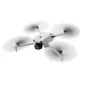 DJI Lito 1 drone in mid-flight with spinning propellers, front camera view, lightweight design for beginners, 4K video and 8K photo capabilities
