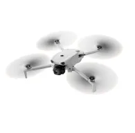 DJI Lito 1 drone in mid-flight with spinning propellers, front camera view, lightweight design for beginners, 4K video and 8K photo capabilitiesDJI Lito 1 drone in mid-flight with spinning propellers, front camera view, lightweight design for beginners, 4K video and 8K photo capabilities