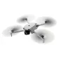 DJI Lito X1 drone in flight with extended arms and active propellers, showcasing its compact design for aerial photography and videography