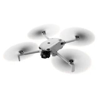 DJI Lito X1 drone in flight with extended arms and active propellers, showcasing its compact design for aerial photography and videography