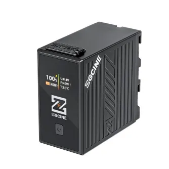 ZGCINE BT-NPF970 L Series 9600mAh battery with OLED display showing 100% charge, USB-C port, and ventilation slots for professional video equipment