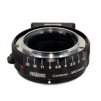 Metabones Contarex to Micro Four Thirds adapter in black matte finish with precision brass construction and chrome plating, featuring aperture scale markings from f/1.4 to f/22.