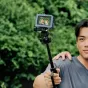 SmallRig VT-15 Mantis Tripod in use with smartphone for outdoor vlogging and mobile photography, featuring an extended telescoping arm and mantis hook for versatile shooting angles