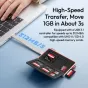 Ulanzi DC01 portable memory card case with USB 3.1 reader, open view showing 8 card slots filled with SD and microSD cards, connected to laptop for fast 312 MB/s transfer