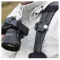 FALCAM F38 Quick Release backpack clip securely mounting Hasselblad camera on strap for hands-free outdoor photography