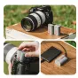 Falcam TagBatt LP-E6 2600mAh USB-C rechargeable battery with Apple Find My tracking, inserted in a Canon DSLR camera battery compartment and connected to a portable power bank for direct charging