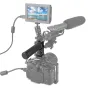 SmallRig QR NATO rubber handle with cold shoe mount for Blackmagic and Scarlet cameras, attached to a professional video camera setup with external monitor and microphone accessories