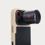 Moment SuperTele 240mm T-Series telephoto lens attached to a smartphone, showcasing its sleek black design and CNC-machined aluminum construction, with the brand name 'Moment' visible on the lens mount.