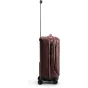 Rear view of Peak Design Roller Pro Carry-On suitcase with extended handle and secure UltraZip closure.