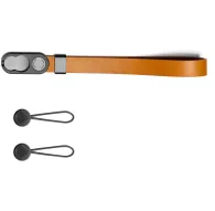 Peak Design amber leather wrist strap featuring metal anchors and carabiner loops for secure camera attachmentPeak Design amber leather wrist strap featuring metal anchors and carabiner loops for secure camera attachment