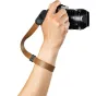 Peak Design amber full-grain leather wrist strap with secure black metal anchor for camera stabilization