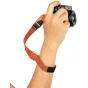 Peak Design Cuff wrist strap in orange with adjustable aluminum adjuster and magnetic clasp for secure camera grip