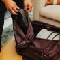 Peak Design Shoe Pouch Eclipse with open leather shoe compartment, compact and lightweight travel shoe storage for backpacks