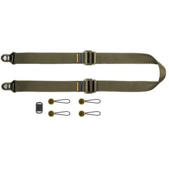 Peak Design Slide Lite camera strap set in Kelp color featuring Anchor Link connectors, hex wrench, and microfiber pouch for secure attachment of mirrorless and DSLR cameras.