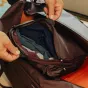 Peak Design Packing Cube Medium Eclipse - open view showing internal compartments, tear-away UltraZip, and compression zipper for organized travel storage