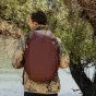 Burgundy Peak Design Travel Backpack 30L Eclipse, rugged outdoor daypack made from weatherproof 400D recycled nylon, perfect for travel and daily use.