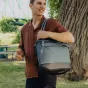 Peak Design Everyday Tote V2 15L ocean gray backpack-style tote bag with magnetic clasp and padded shoulder strap, perfect for daily use and outdoor adventures.