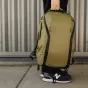 Peak Design Everyday Backpack Zip V2 15L in kelp color – weatherproof urban backpack made from durable 400D recycled nylon, featuring a luggage pass-through and dual side pockets for water bottles or tripods.